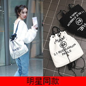 夏帆布包印花抽绳水桶双肩包女包休闲时尚 背包妈咪包 包包2017新款