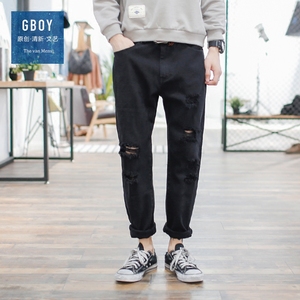 青年纯色破洞水洗牛仔裤